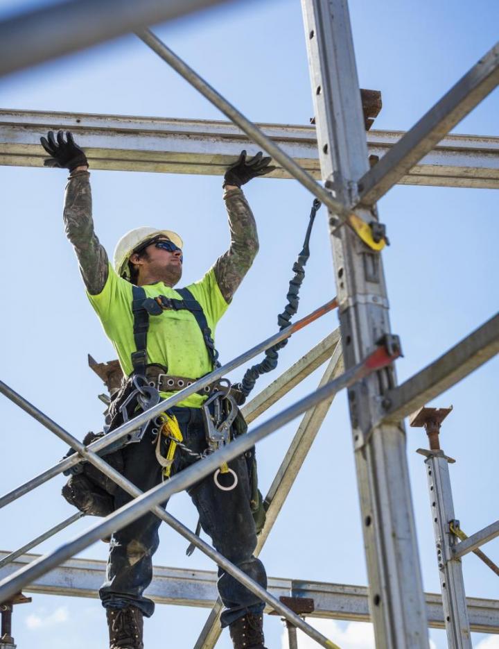 Photo of a man working on a construction site