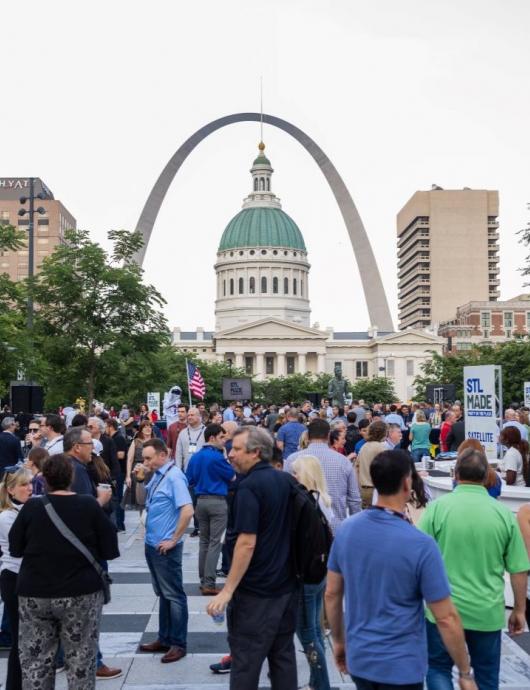 stlmade_party_on_the_plaza_1.jpg crowd of people congregating in front of the St. Louis Arch