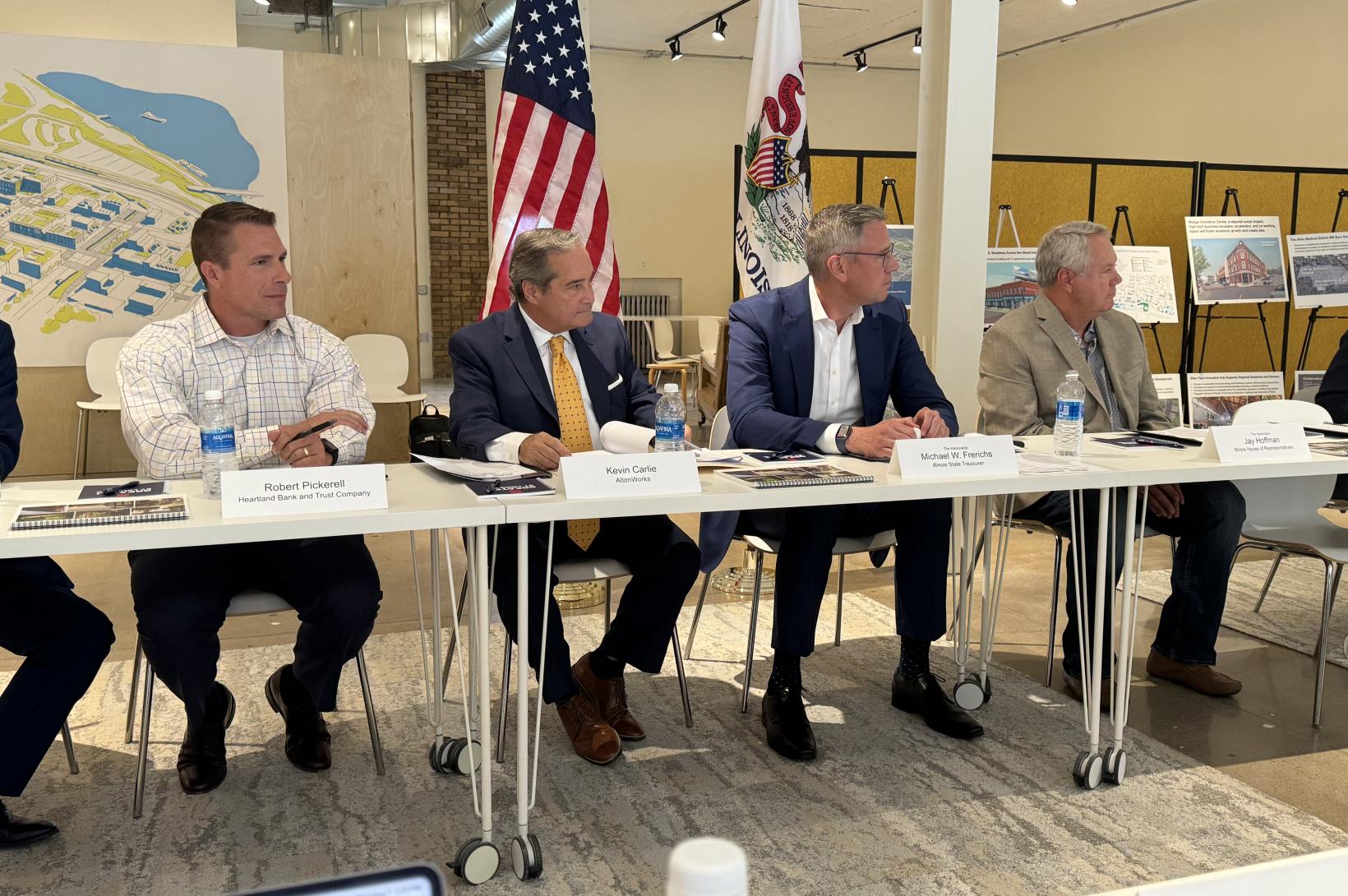 Four men in suits sit together at a table: Business and legislative leaders meet with Illinois State Treasurer Michael W. Frerichs as part of a roundtable discussion.