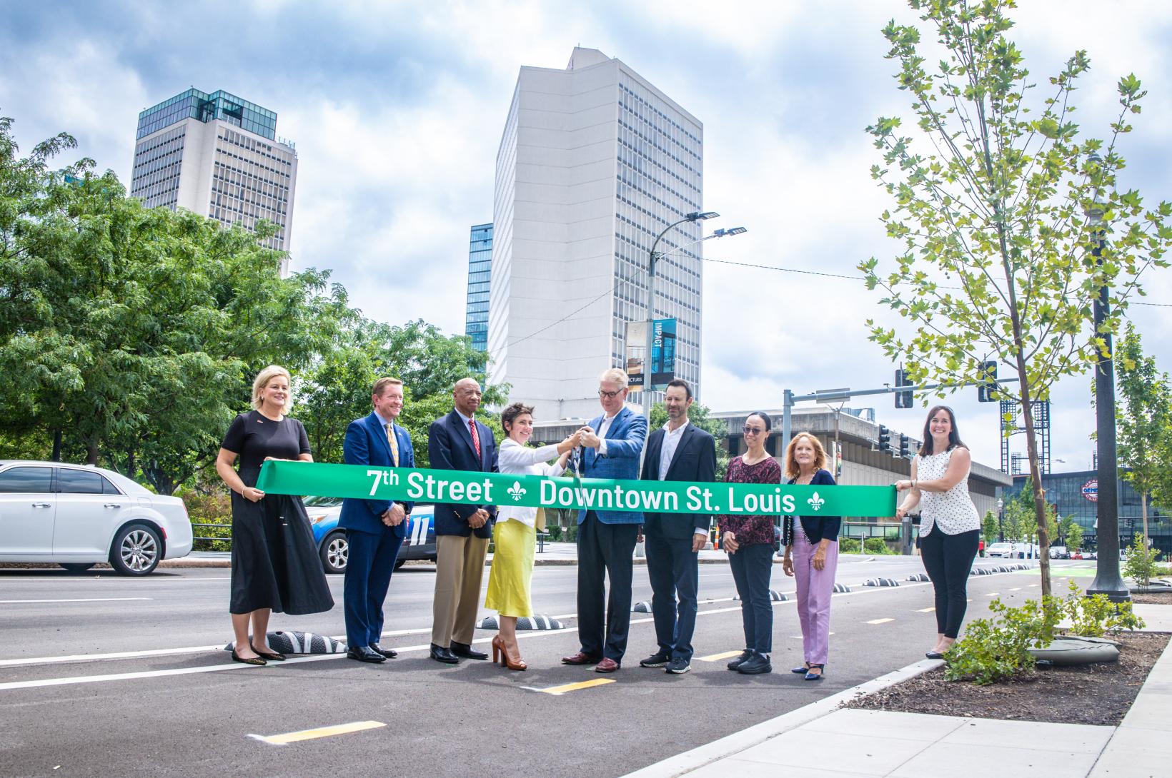 7th Street Ribbon Cutting A group of St. Louis leaders cuts a green ribbon, celebrating the redevelopment of 7th Street in Downtown.