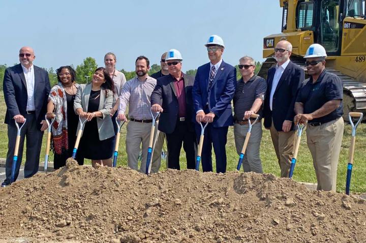 STLCC Groundbreaking: a line of St. Louis leaders holding shovels