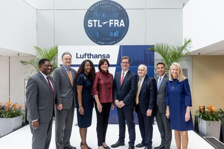 A group of St. Louis civic leaders celebrates the first Lufthansa flight out of St. Louis.