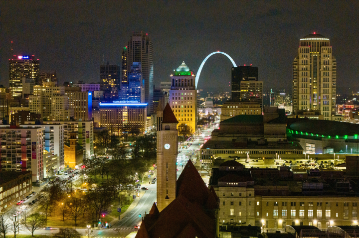 Downtown St. Louis skyline taken at night looking east on Market street toward the Gateway Arch.