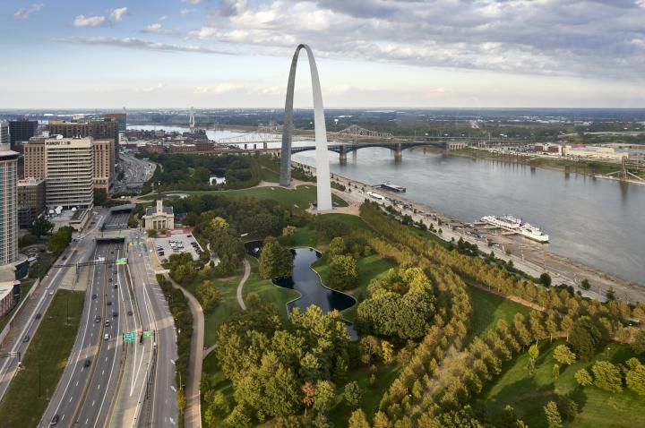 A photo of the St. Louis skyline taken from the southwest, featuring Downtown, the Arch, and the Mississippi River.