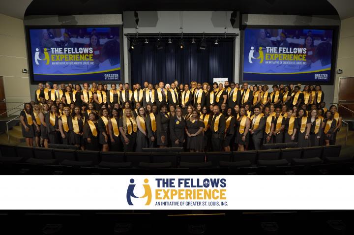 A photo of 2024 Fellows Experience graduates on the stage at Edward Jones headquarters