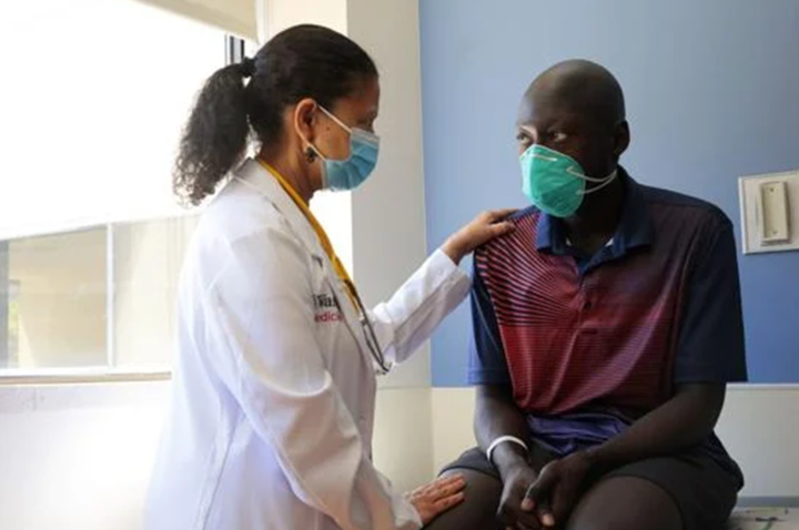 A physician treats a patient at St. Louis Children's Hospital