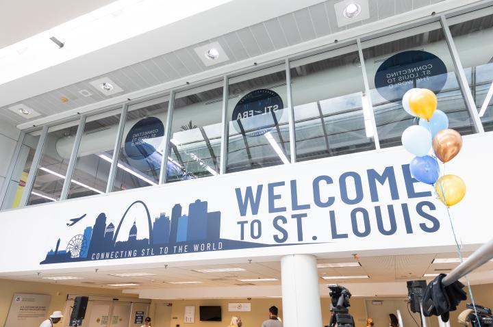A sign reads "Welcome to St. Louis" at St. Louis Lambert International Airport